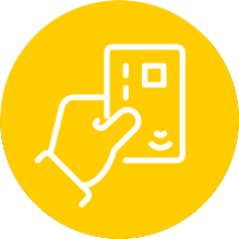 Hand holding a contactless payment card against a bright yellow background, illustrating modern payment methods and convenience.